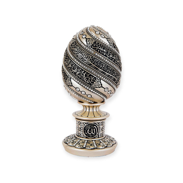 A beautiful golden and black egg sculpture engraved with Ayatul Kurs- BB-0988